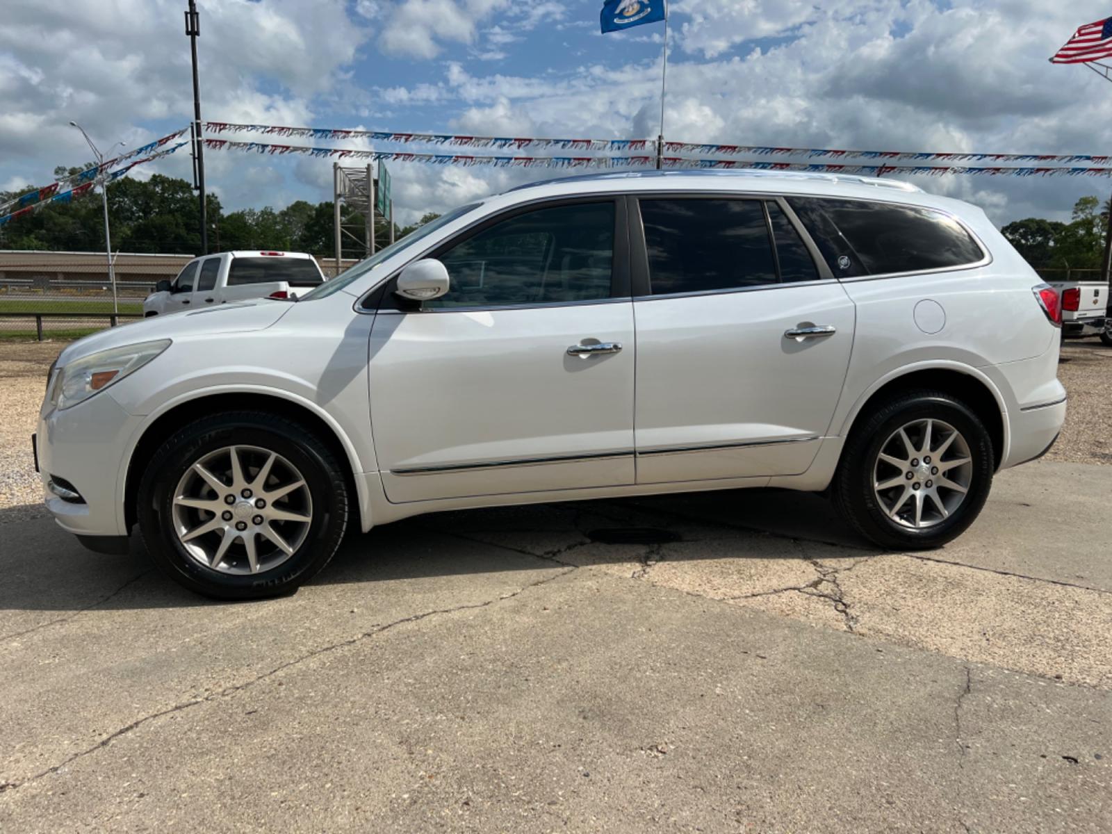 2016 White /Gray Buick Enclave (5GAKRBKD2GJ) with an 3.6 V6 engine, Automatic transmission, located at 4520 Airline Hwy, Baton Rouge, LA, 70805, (225) 357-1497, 30.509325, -91.145432 - 2016 Buick Enclave ****One Owner & No Accidents**** 3.6L V6 Gas, 141K Miles, Heated Leather Seats, 7 Passenger Seating, Sunroof, Backup Camera, Power Windows, Locks & Mirrors, Cold A/C, Bose, Power Liftgate. FOR INFO PLEASE CONTACT JEFF AT 225 357-1497 CHECK OUT OUR A+ RATING WITH THE BETTER BUSINE - Photo #1